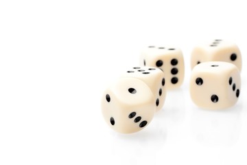 white dice on white table with space for text