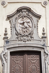 Fototapeta na wymiar Madrid - Relief and baroque portal San Miguel church