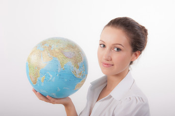 Fototapeta premium Young Woman Holding Globe Of The World
