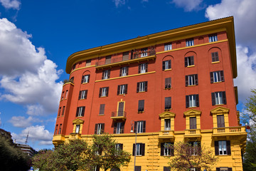 Fototapeta na wymiar Rome city architecture full of colors on blue sky day in summer