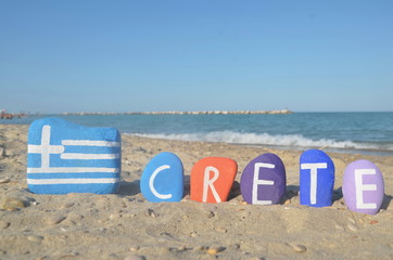 Fototapeta na wymiar Souvenir of the greek isle Crete on colourful stones