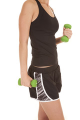 Woman black fitness tank body green weights