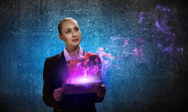 Young business woman with ipad