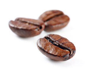Coffee beans isolated over white