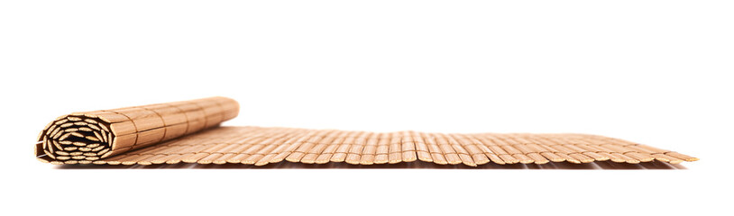 Rolled straw mat isolated