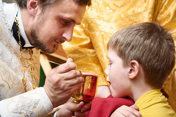 Orthodox ceremony of the Eucharist - obrazy, fototapety, plakaty