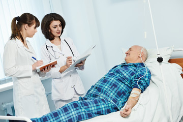 medic doctor in hospital with patient