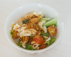 Thai vegetable noodle spicy in white bowl