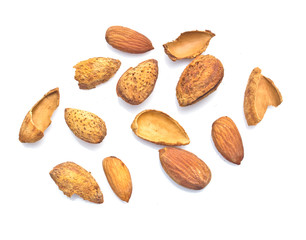 Seeds and almonds on a white background.