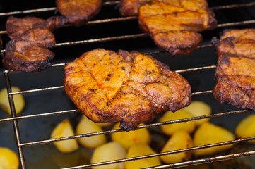 Pork neck grilled in the kitchen oven