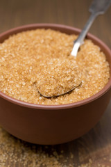 brown sugar in a bowl, selective focus, close-up