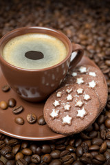 cup of black coffee and Christmas cookies