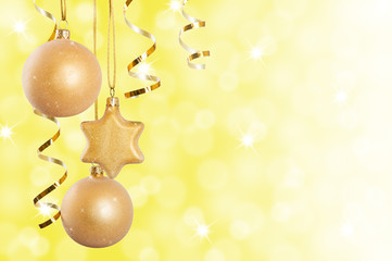 Naklejka na ściany i meble Golden Christmas decorations over sparkling background