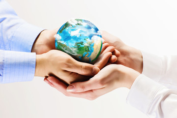 Earth planet in hands