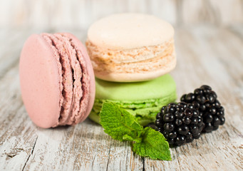 colorful macaroon with mint and blackberries