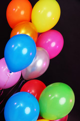 Fototapeta na wymiar Many bright balloons close-up