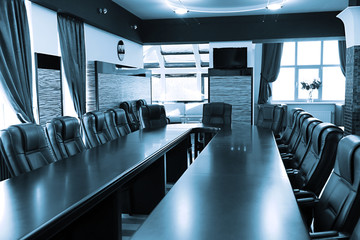 Interior of empty conference room in shades of grey