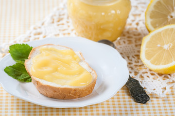 Homemade lemon curd with fresh lemons