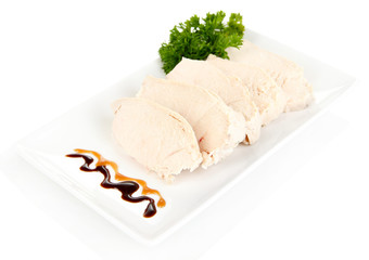 Boiled chicken meat with balsamic sauce, isolated on white