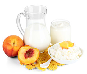 Fresh dairy products with peaches isolated on white