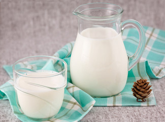Milk in jug and glass  on the table