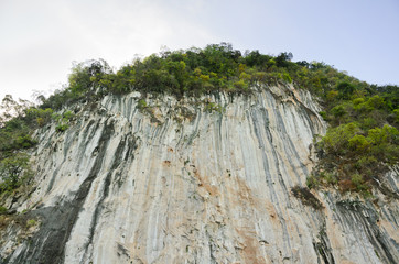 High cliffs of limestone mountain.