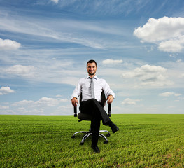 boss sitting on chair at outdoor