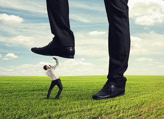 boss trampling down his subordinate