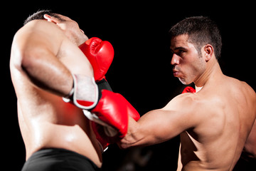 Fototapeta na wymiar Boxing uppercut during a fight