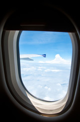 Fototapeta premium Classic image through aircraft window onto airplane