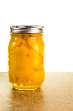 Sliced peaches in a mason jar
