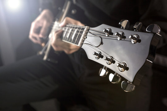 Playing guitar