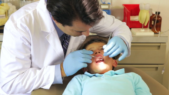 Boy Having Dental Check Up