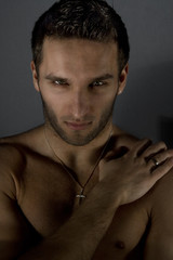 Obraz premium Portrait of sexy naked man posing in studio
