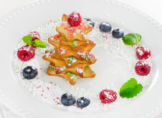 Christmas dessert -  tree of chookies with berries and mint