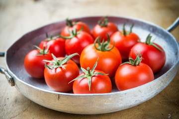 Rustic tomatoes in a metal skillet