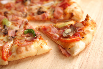 Pizza ham and mushroom isolated in white background