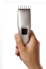 hair clipper in hand