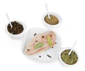Assortment of spices in  white  bowls,