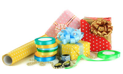 Materials and accessories for wrapping gifts isolated on white