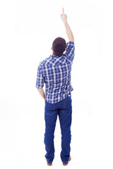 Back view of young man pointing up, isolated over white backgrou