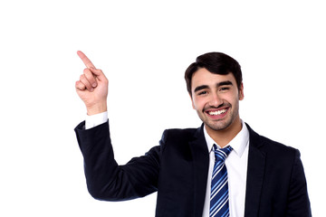 Handsome businessman pointing at something