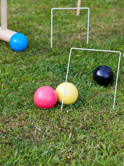 game of croquet on green lawn