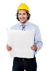 Handsome architect with construction plan