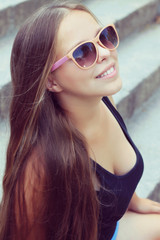 Naklejka premium young woman with very long hair. fashion photo shoot 