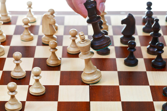black king beats white king in chess game