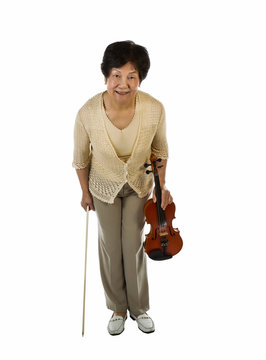 Senior Woman Taking A Bow After Playing Violin