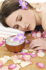 Obraz na płótnie Canvas portrait of woman getting massage and spa treatment