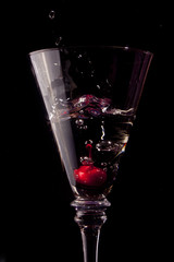 Cherry Dropped into a Martini