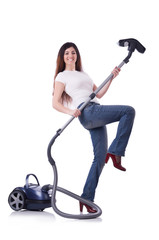 Young woman with vacuum cleaner on white